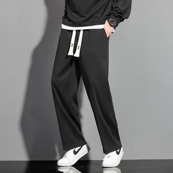 Новые модные повседневные брюки корейского дизайна для мужчин, модные спортивные штаны и расклешенные брюки